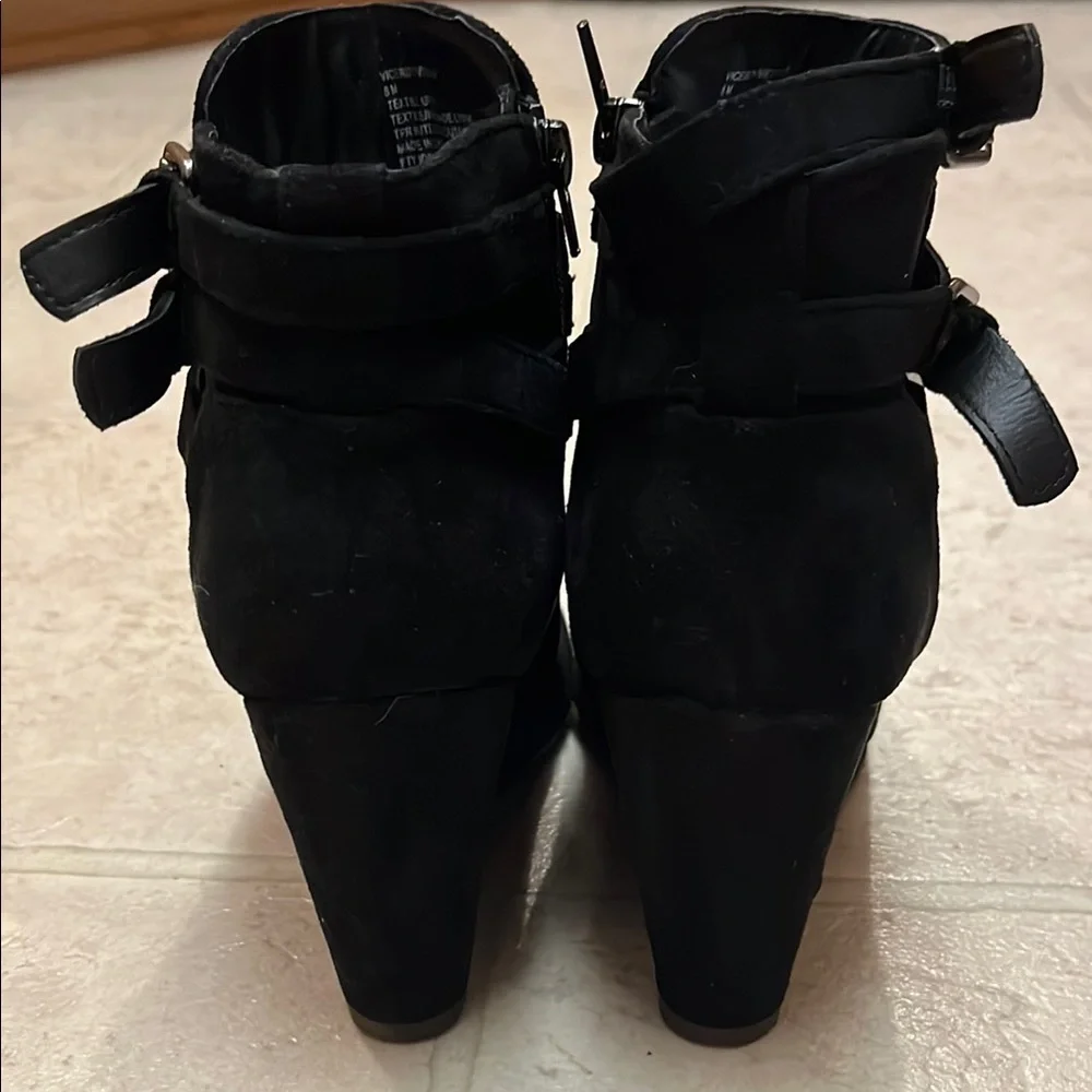 Black Heeled Boots with Wedge Heel and Decorative Strap - Picture 2 of 4